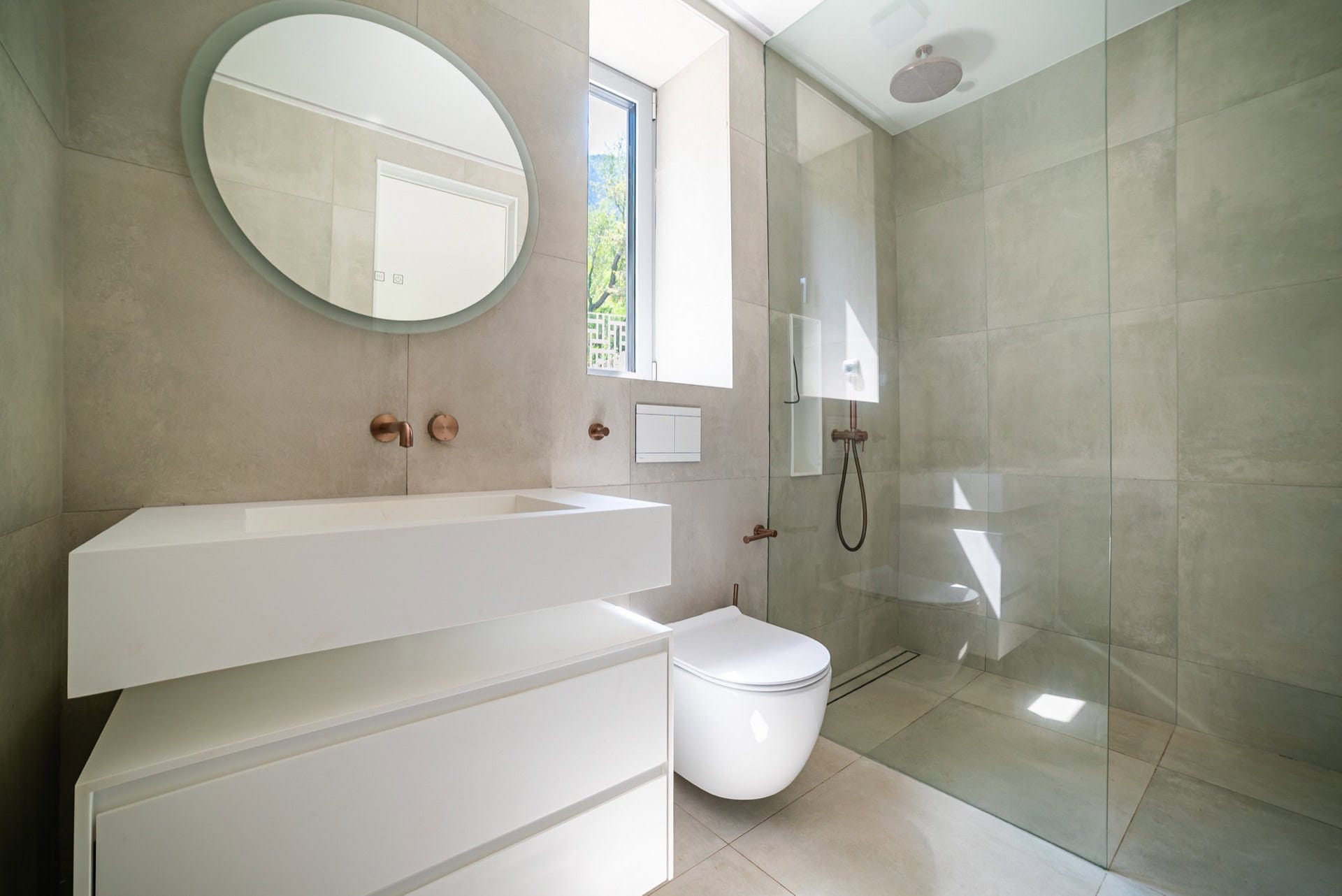 Modern bathroom with a shower cabin and stylish finishes in a villa in Blizikuće, Montenegro.