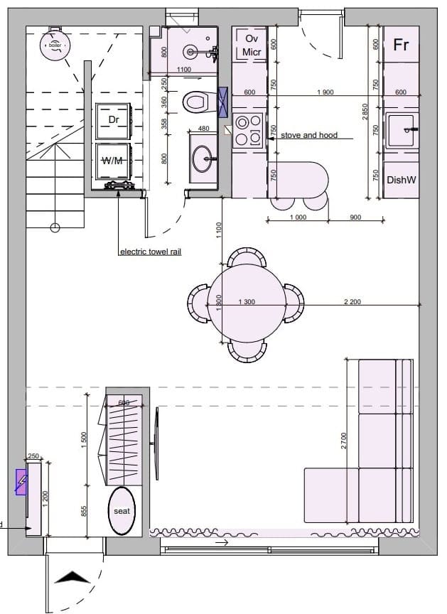 Apartment layout in the Kavac residential complex, Montenegro: living room with kitchen, dining area, bathroom, and staircase to the second floor.