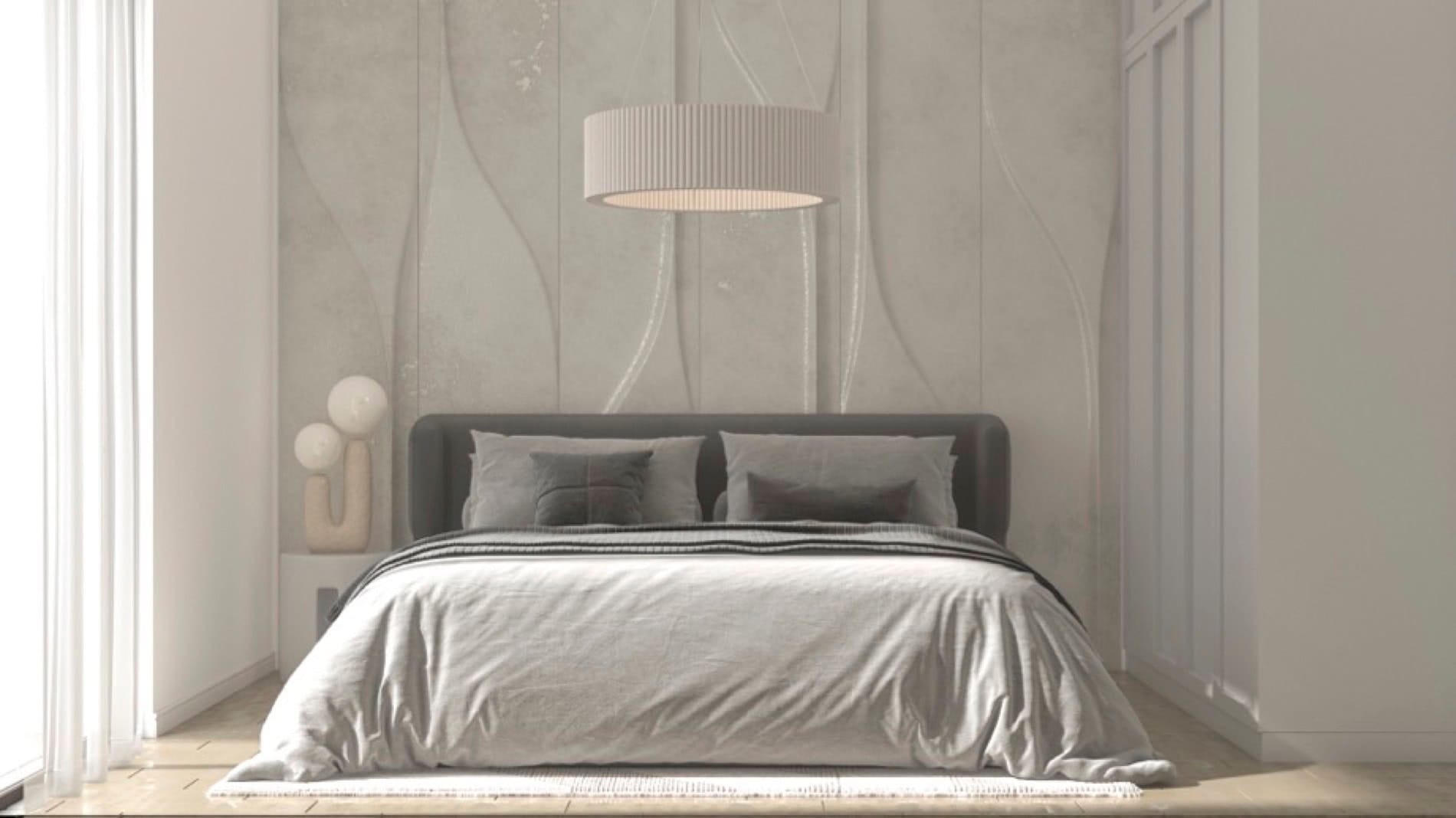 Modern bedroom with a designer wall in a residential complex in Muo, Montenegro: double bed, stylish lamp, and decor.