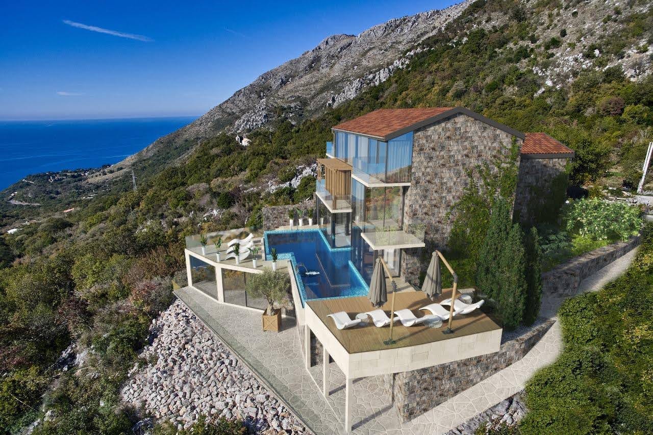 Modern villa in Petrovac, Montenegro: stone cladding, panoramic windows, a swimming pool, and a terrace with sea views.