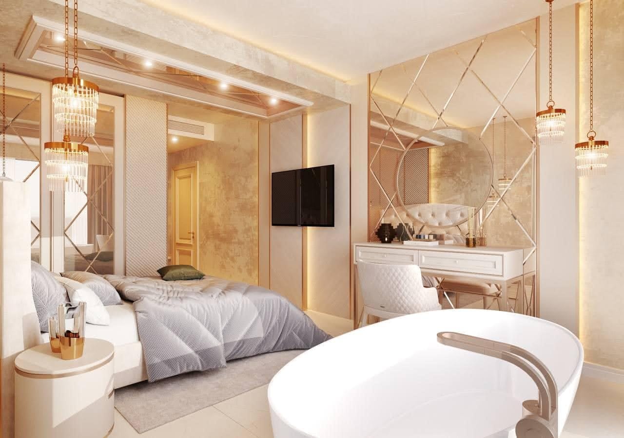 Luxurious bedroom with bathroom and mirrored decor in a villa in Petrovac, Montenegro: stylish interior and design.