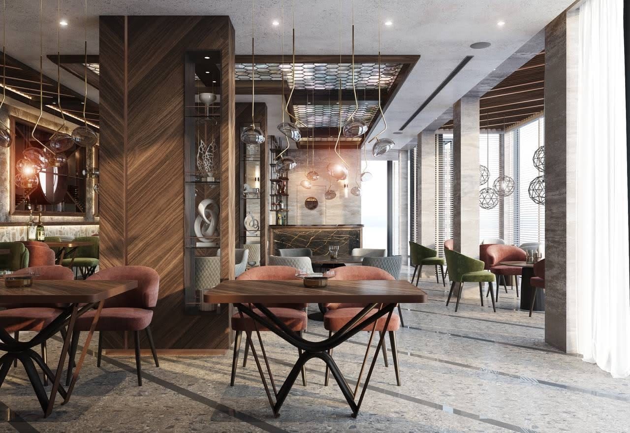 Interior of the villa restaurant in Petrovac, Montenegro: designer furniture, wood finishes, and panoramic windows.