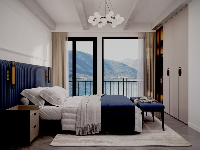 Bedroom in a villa in Stoliv, Montenegro: modern interior with panoramic sea and mountain views, double bed.