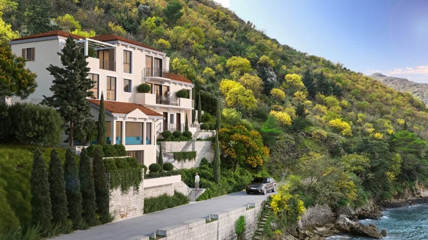 Three-story Mediterranean-style villa with terraces and a garden on the coast in Stoliv, Montenegro.