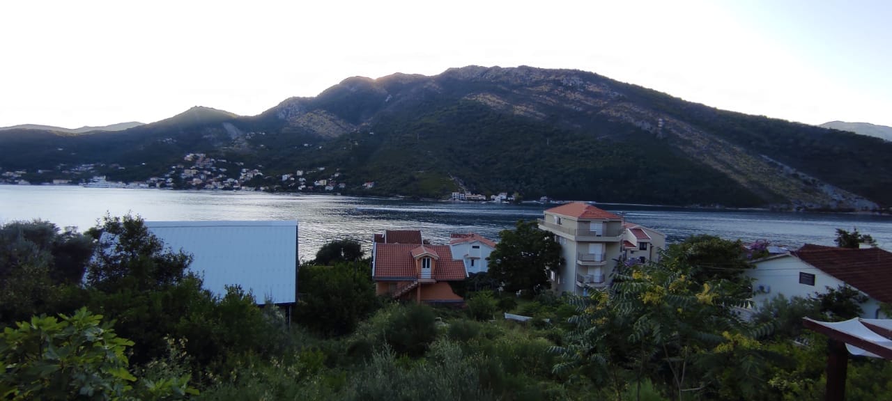 Panoramic view of the Bay of Kotor and the mountains from an apartment in Lepetane, Montenegro.