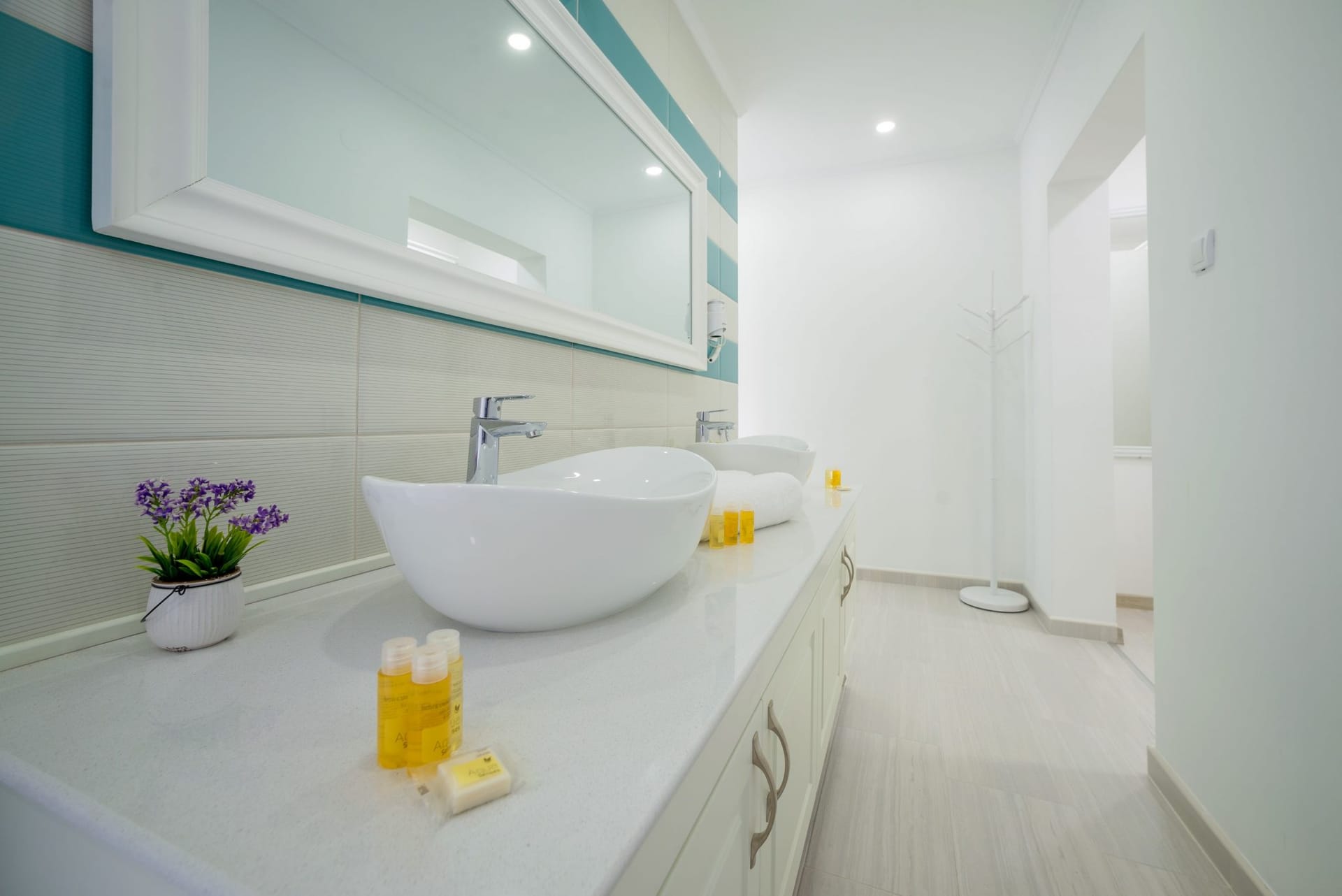 Modern bathroom with two sinks in a villa in Stoliv, Montenegro: stylish finishes and a bright interior.