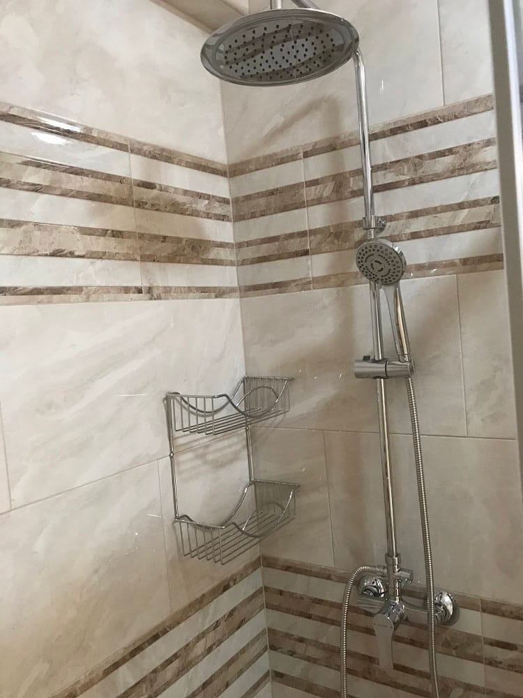 Modern shower cabin with a rain shower in the apartment bathroom, Dobri Vody, Montenegro.