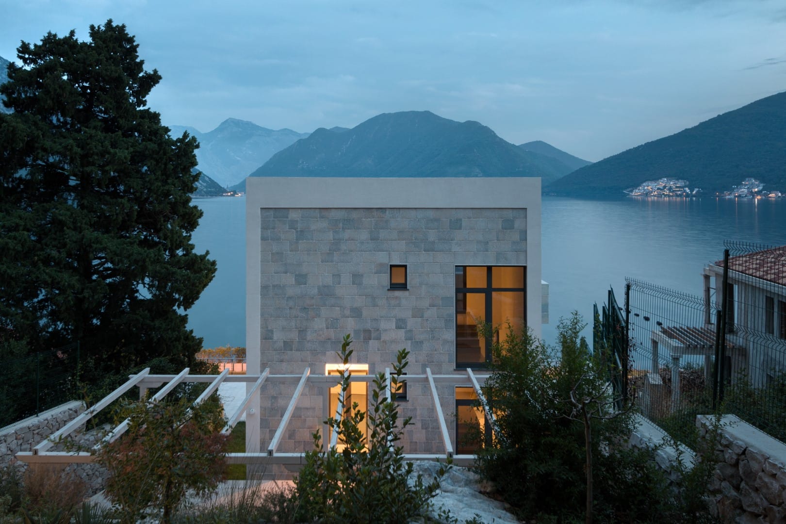 Modern stone villa with a terrace and views of the Bay of Kotor, Strp, Montenegro.