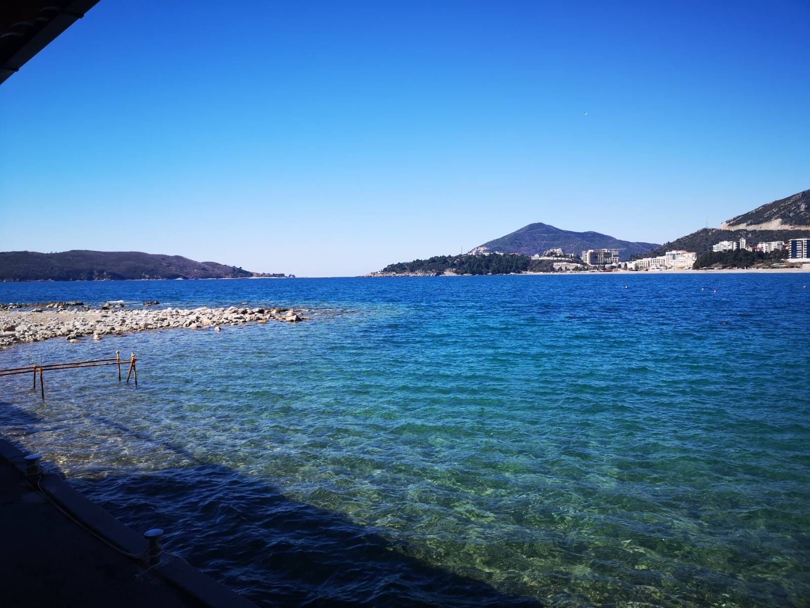 Panoramic view of the Adriatic Sea and the beach from a commercial space in Rafailovići, Montenegro.