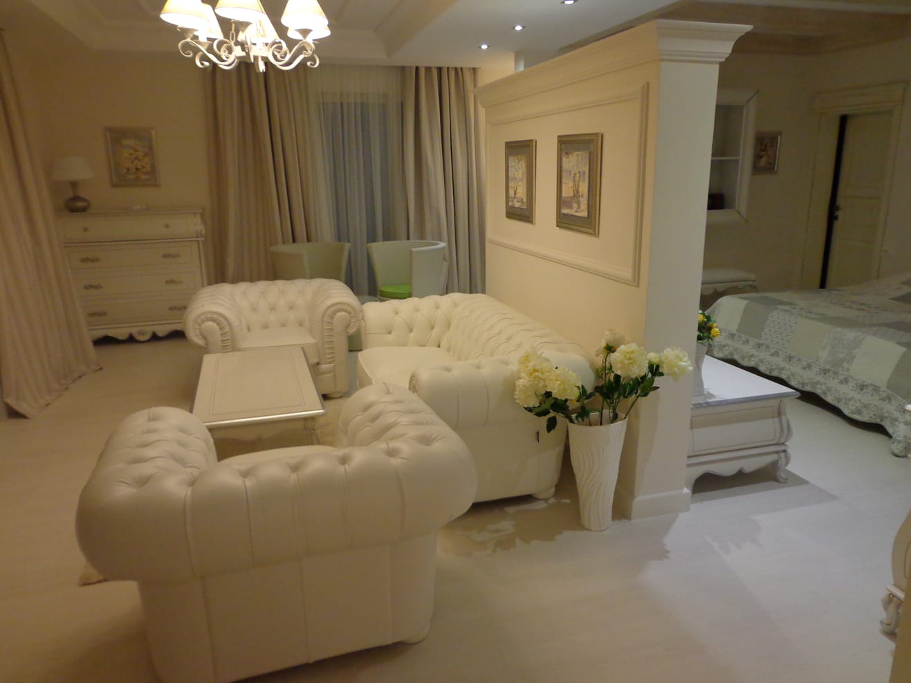 Living room with white leather furniture in a classic style in a villa in Dobra Voda, Montenegro.