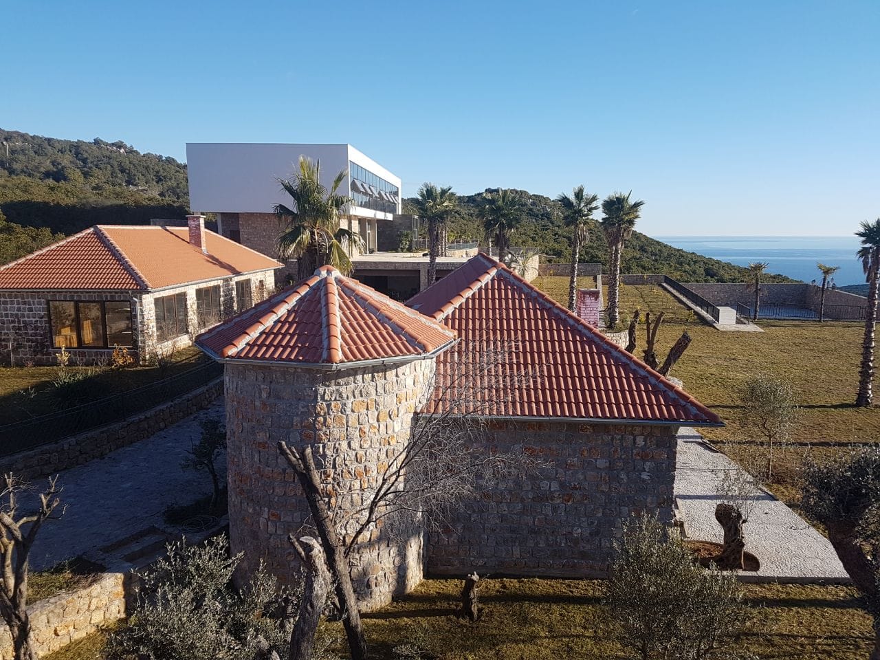 Modern villa with stone cladding and panoramic sea views in the village of Krimovica, Montenegro.