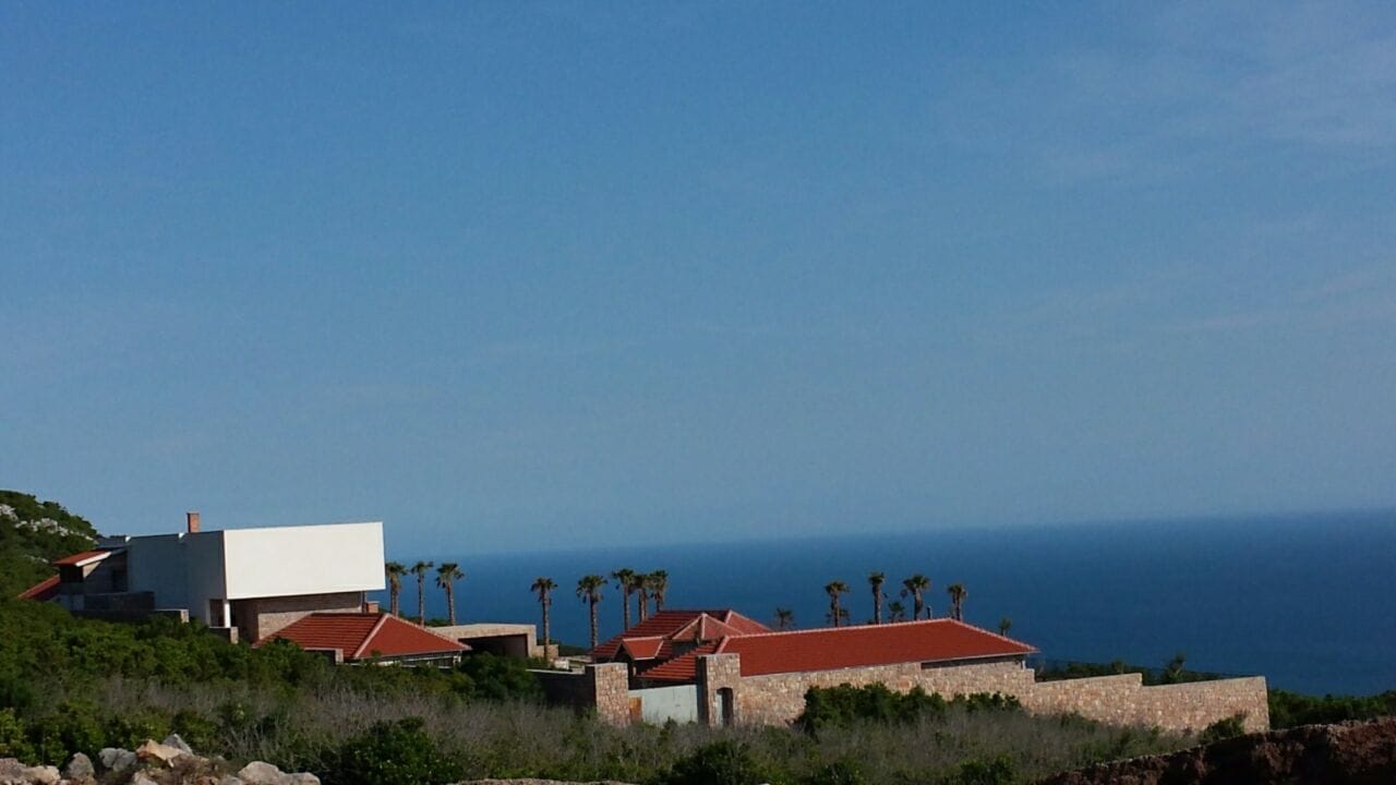 Modern villa with a tiled roof and sea view in Krimovica, Montenegro: exterior of the property.