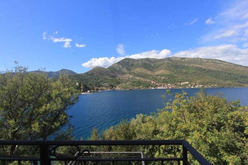 Panoramic sea and mountain view from the villa balcony in Lepetani, Montenegro: a picturesque view from the terrace of property No. 919.