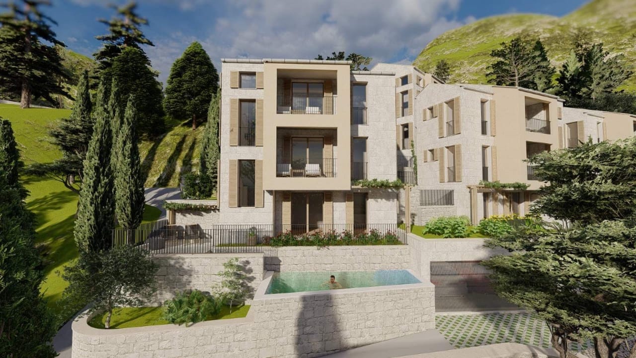 Modern villa with a pool and stone facade in Kamenovo, Montenegro: view of a luxury real estate project.