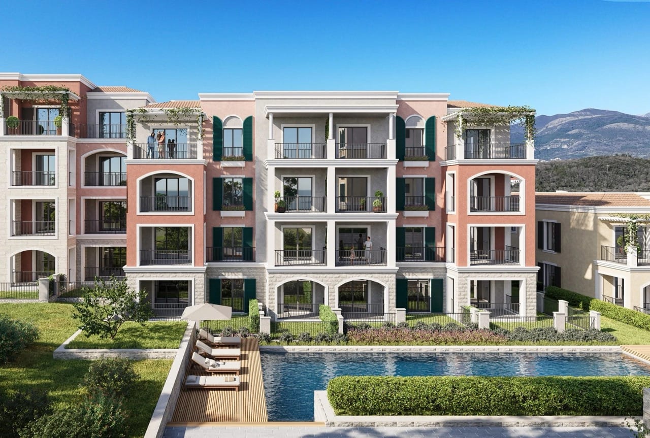 Modern residential complex in Luštica Bay, Radovići, Montenegro with a swimming pool, terraces, and mountain views.