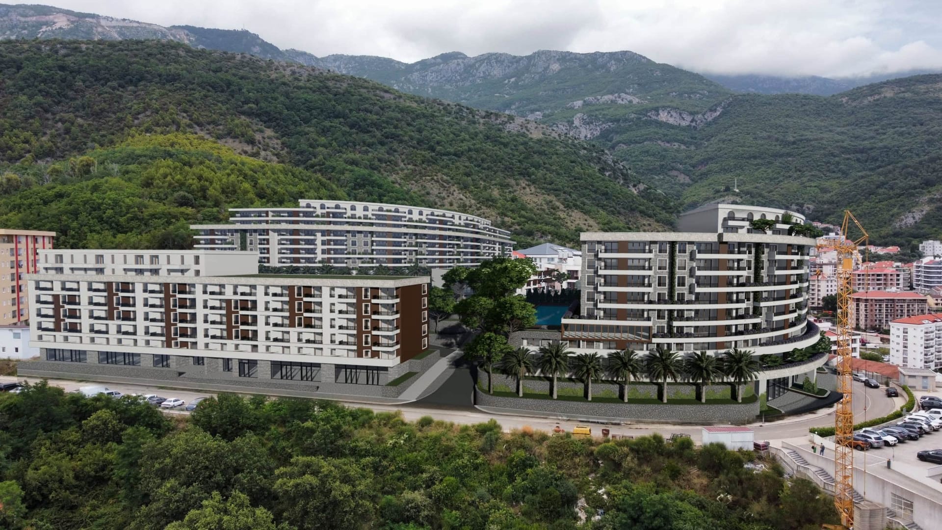 Visualization of a modern residential complex in Bečići, Montenegro: panoramic view of the buildings with terraces and the mountains.