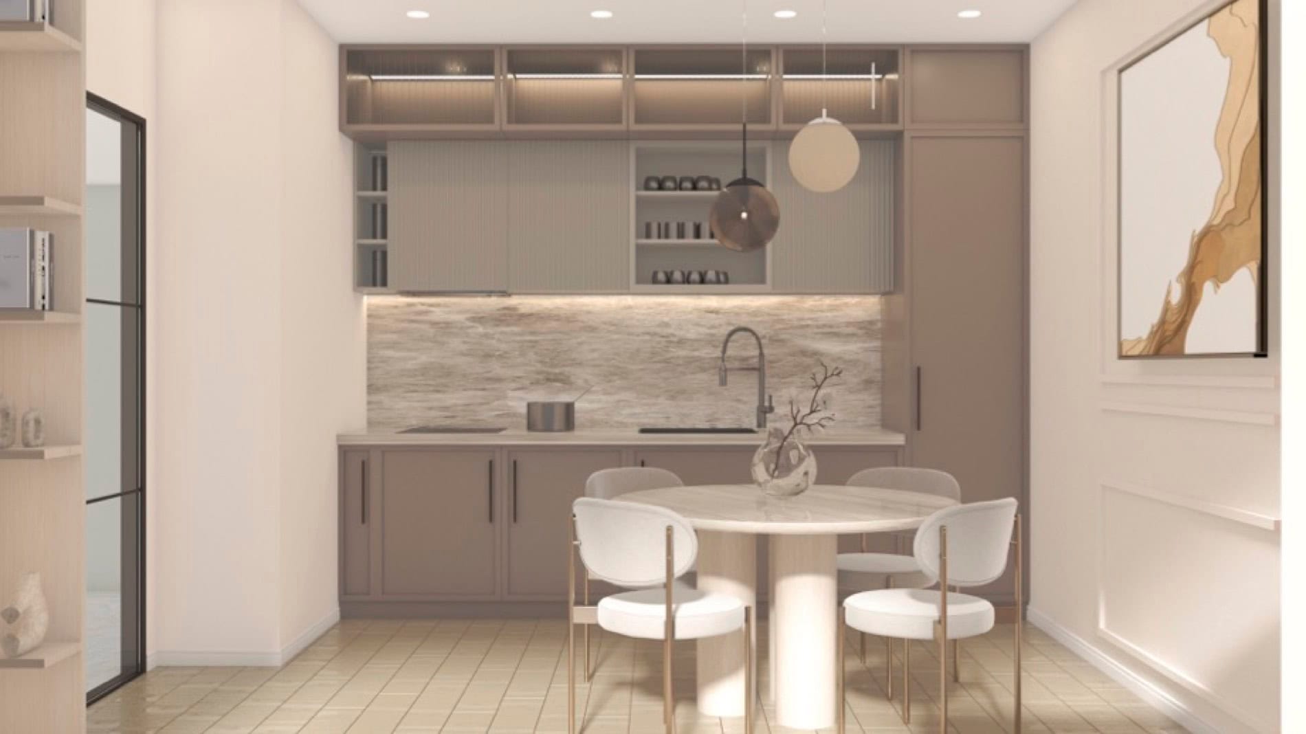 Modern kitchen with dining area in Muo residential complex, Montenegro: beige cabinets, marble backsplash, and a round table.