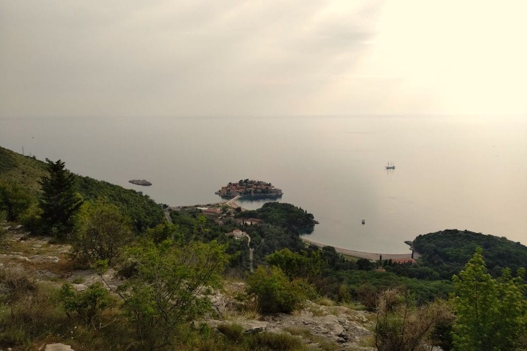 Panoramic view of Sveti Stefan Island and the Adriatic Sea from a plot of land in Montenegro.