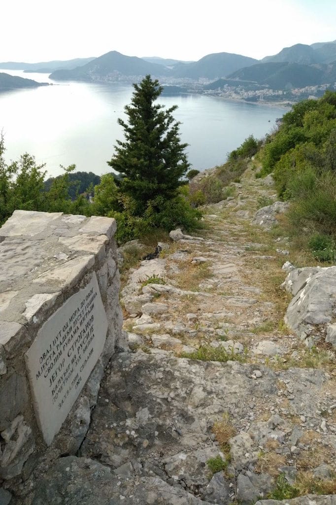 Sea and mountain view from the historic stone path in Sveti Stefan, Montenegro, near plot No. 1209.