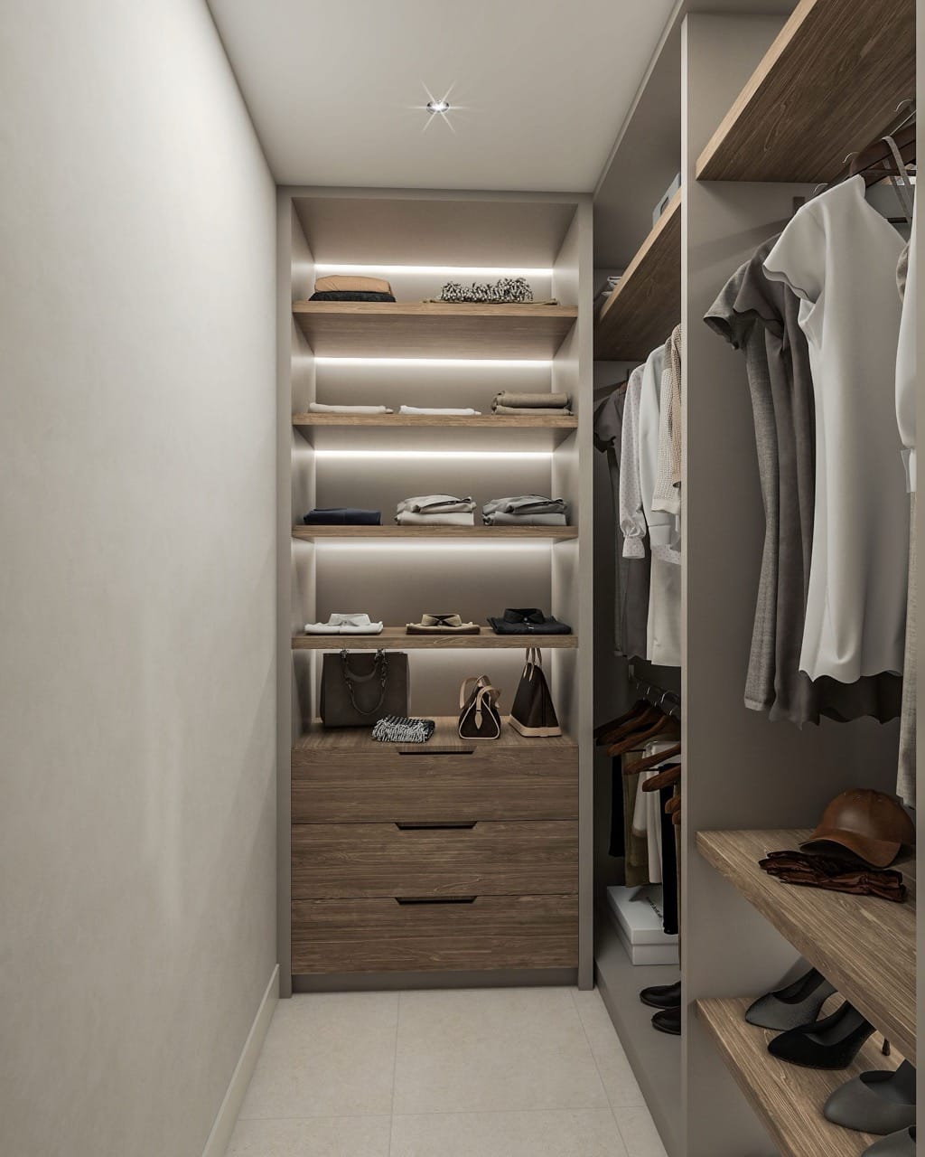 Modern walk-in closet with shelf lighting and wooden drawers in a villa in Luštica Bay, Radovići, Montenegro.