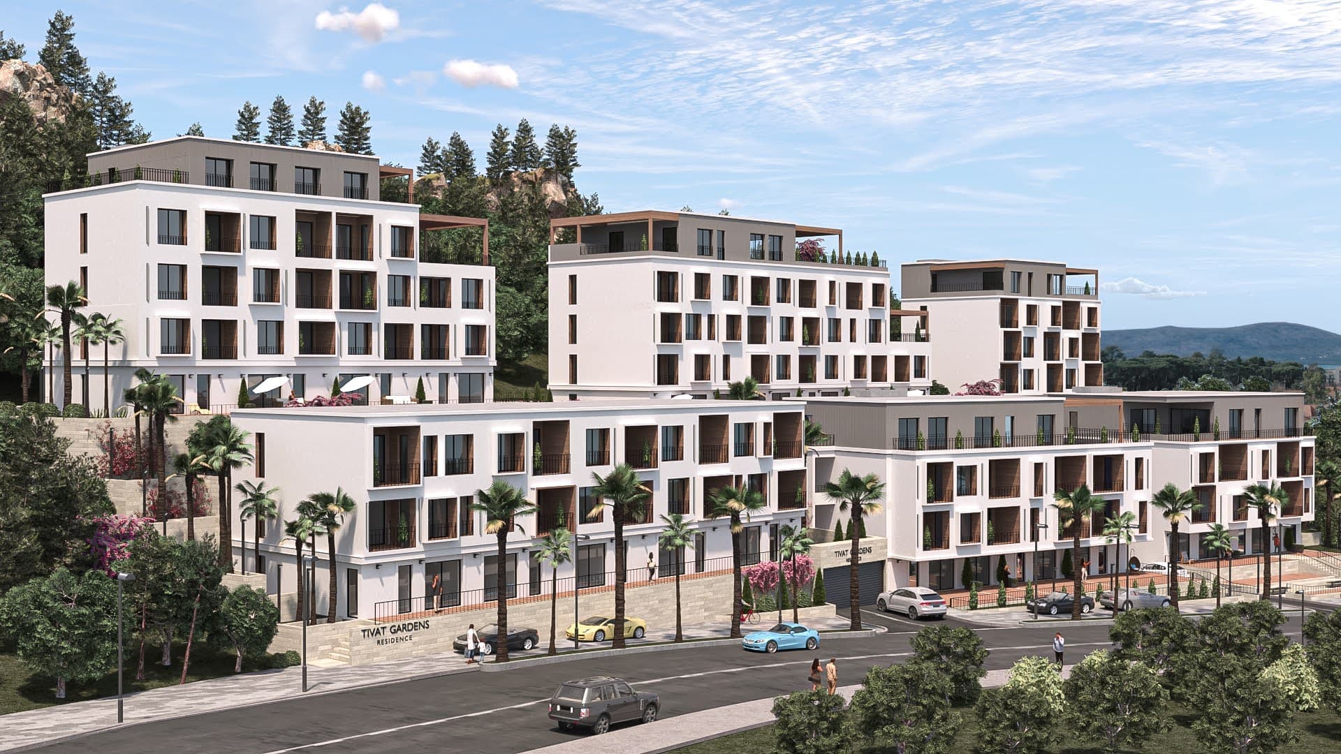 Жилой комплекс Tivat Gardens в Черногории: современные белые здания с террасами, пальмами и благоустроенной территорией.