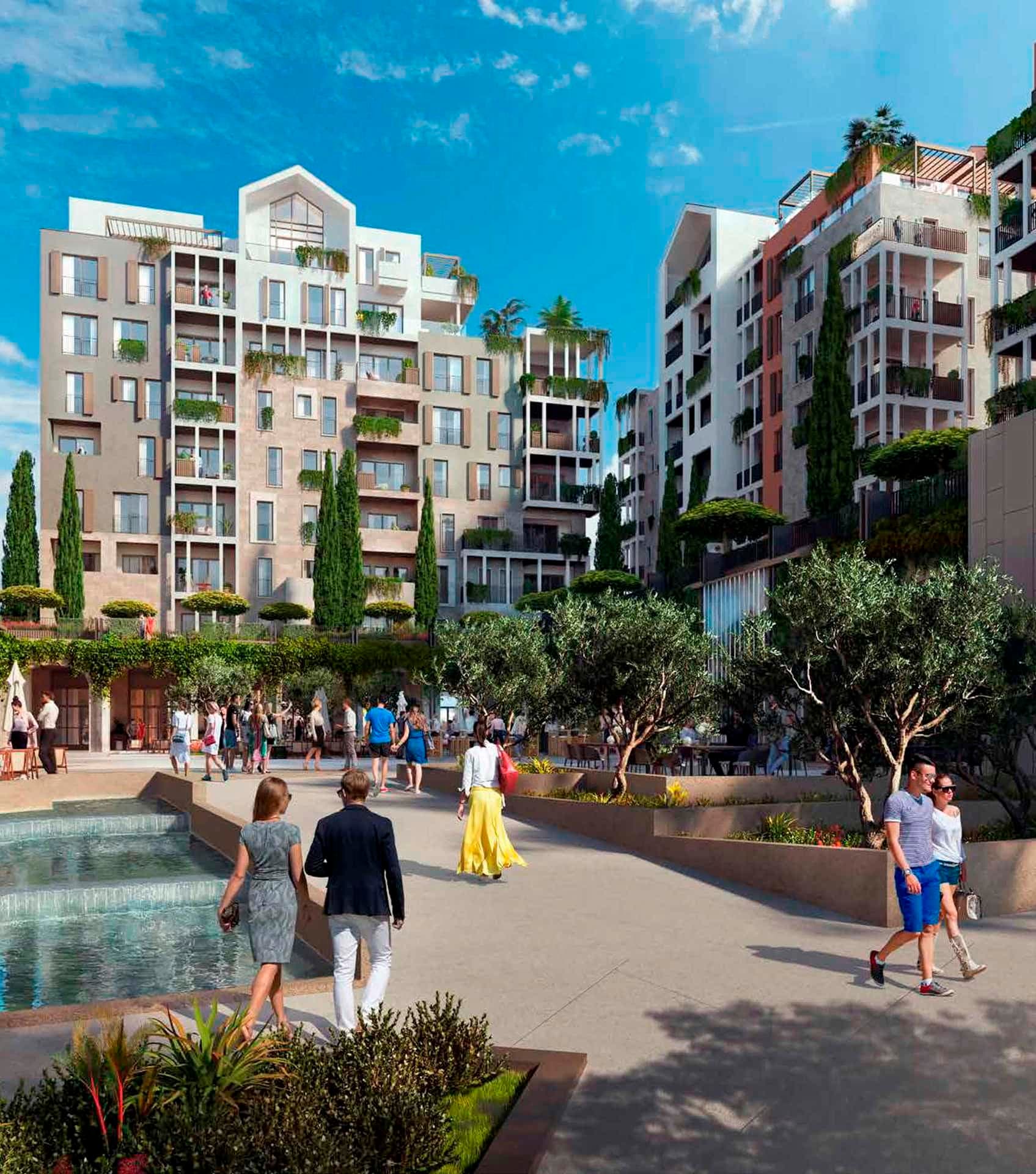 Современный жилой комплекс Boka Place в Тивате, Черногория: благоустроенная территория с фонтаном, деревьями и людьми.