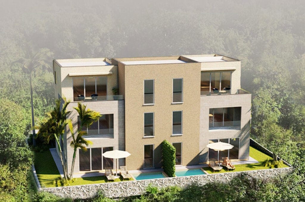 Modern villa with a pool and terraces in Stoliv, Montenegro: view of a residential complex surrounded by greenery.