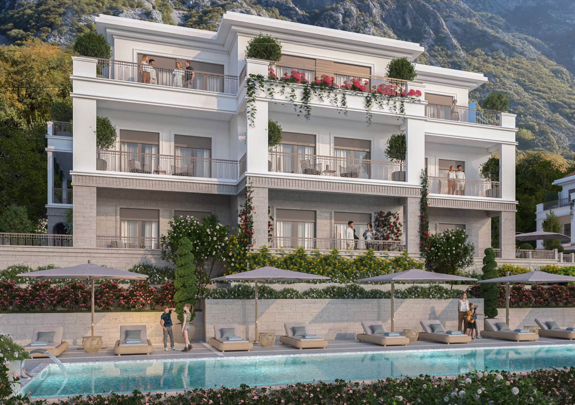 Modern residential complex in Ljuta, Montenegro: a three-story building with a pool, terraces, and mountain views.