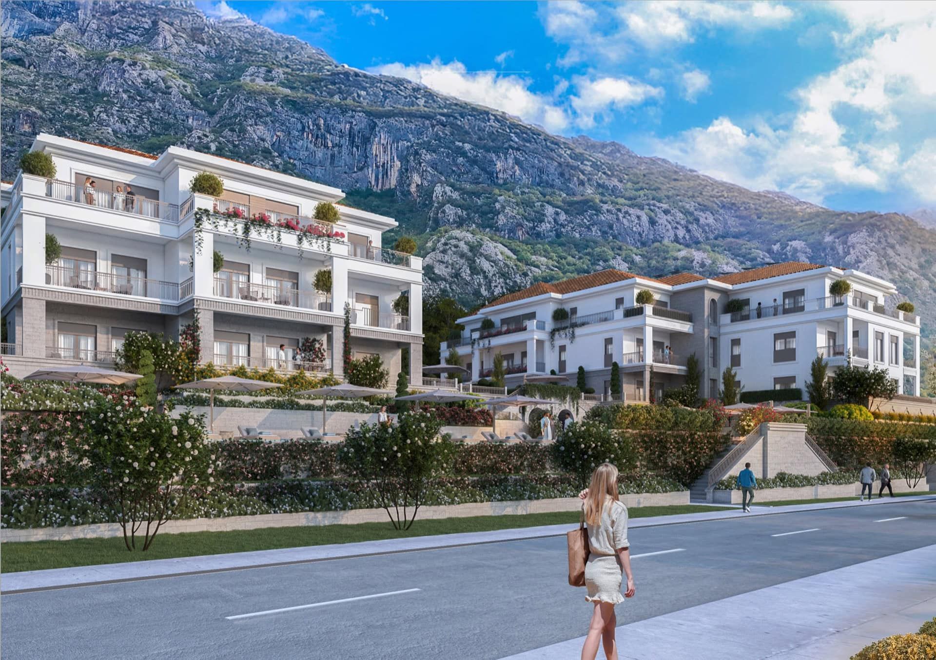 Residential complex in Ljuta, Montenegro: modern villas with terraces, landscaped grounds, and mountain views.