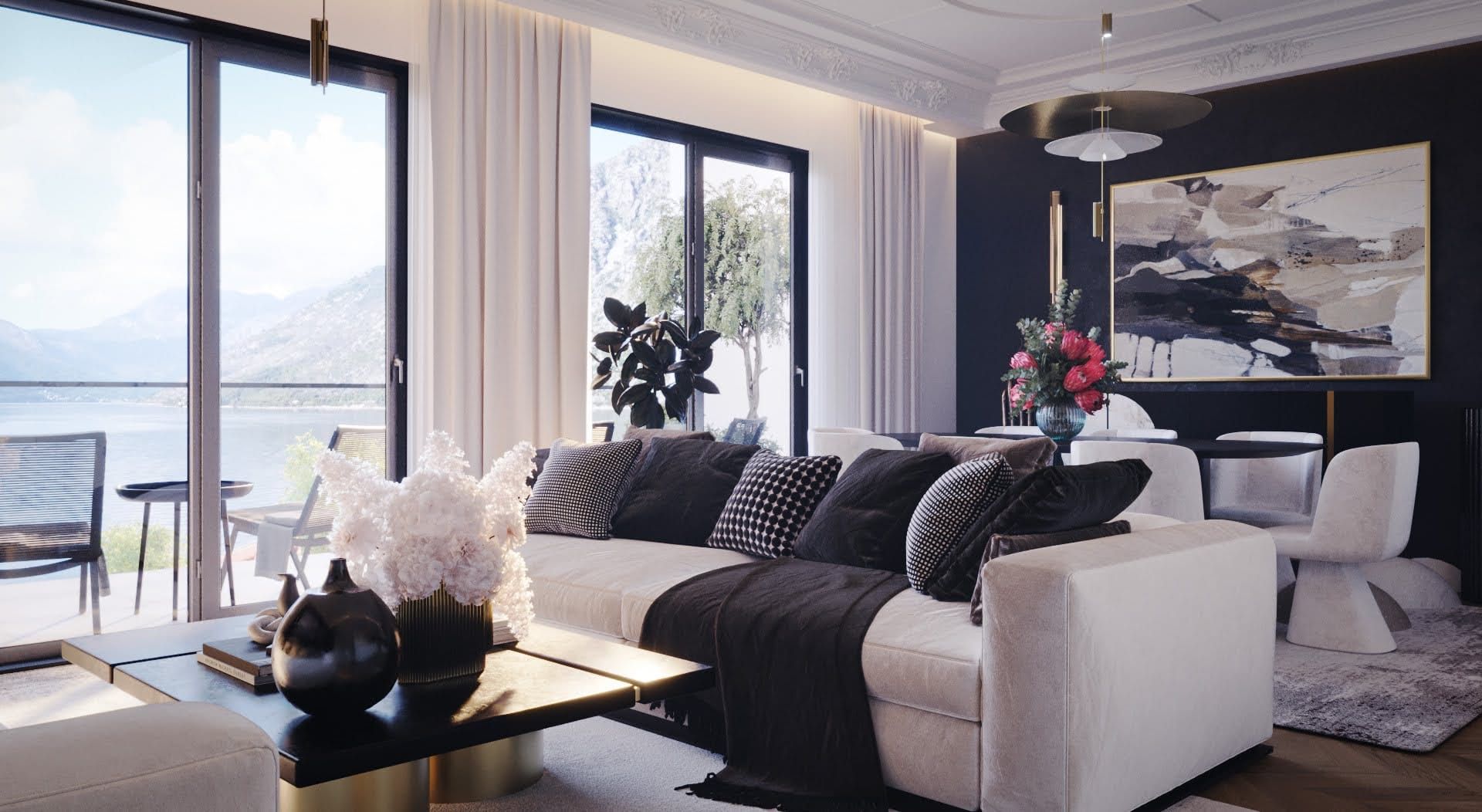 Living room design in the Lyuta residential complex, Montenegro: a light sofa, panoramic windows with sea and mountain views, stylish interior.