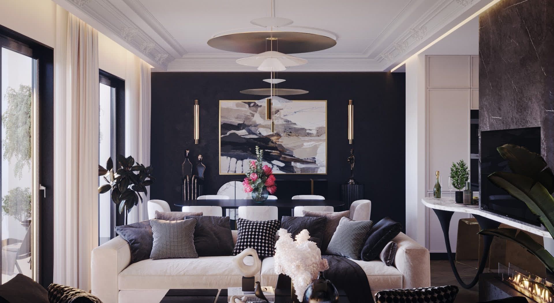 Designer living room in the Lyuta residential complex, Montenegro: light sofa, dark accent wall, fireplace, and dining area.