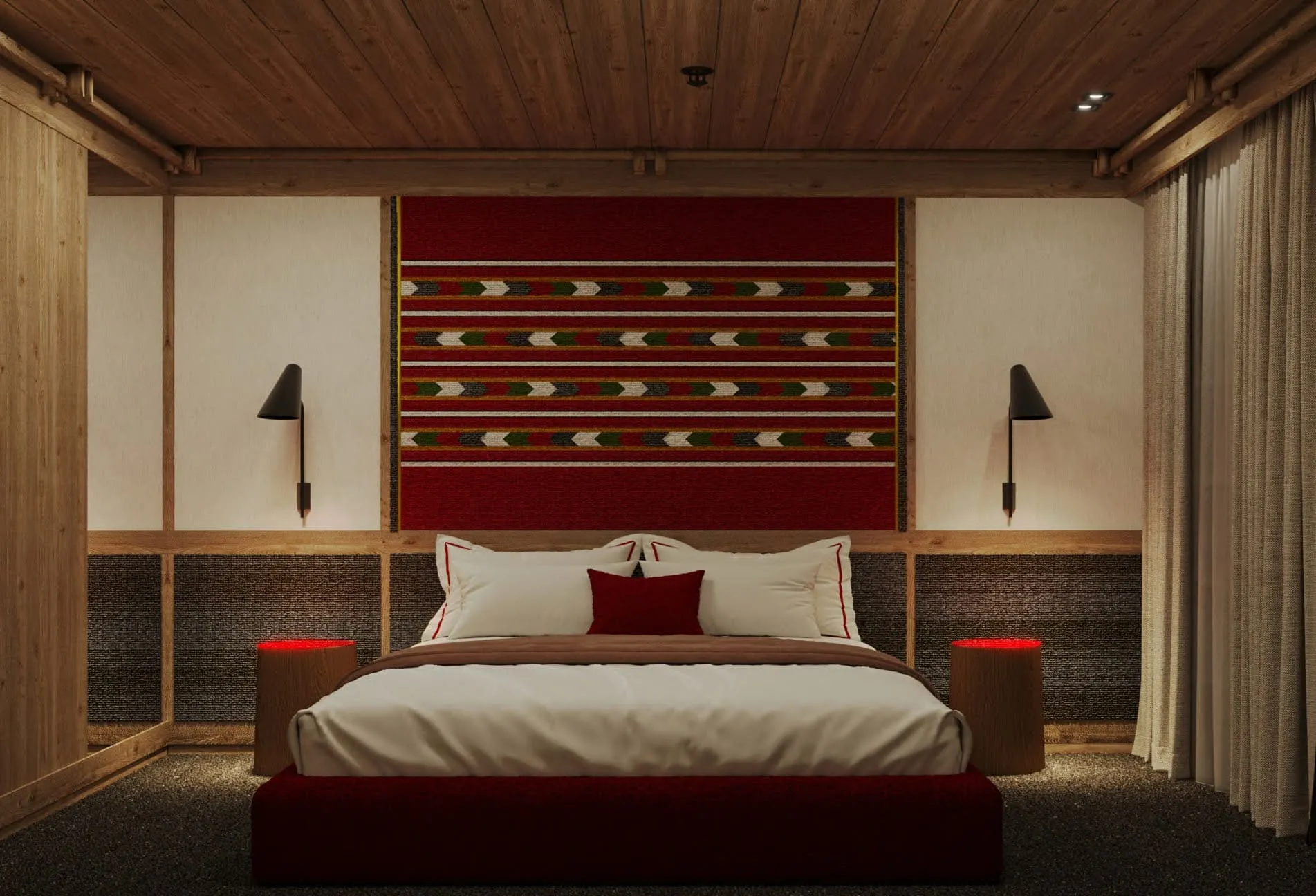 Bedroom with wood ceiling, large bed on red base, and red patterned tapestry headboard flanked by black sconces.