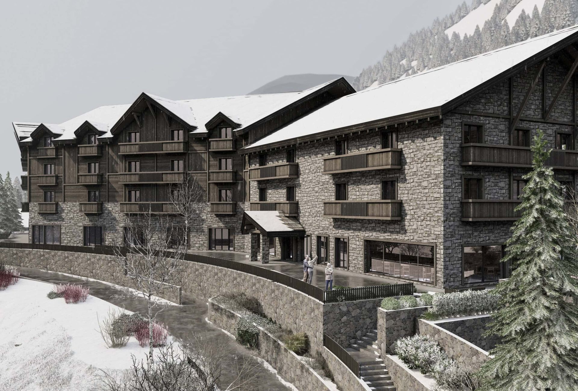Facade of a mountain hotel in Kolašin, Montenegro: stone and wood finishes, balconies, and the complex’s snow-covered grounds.