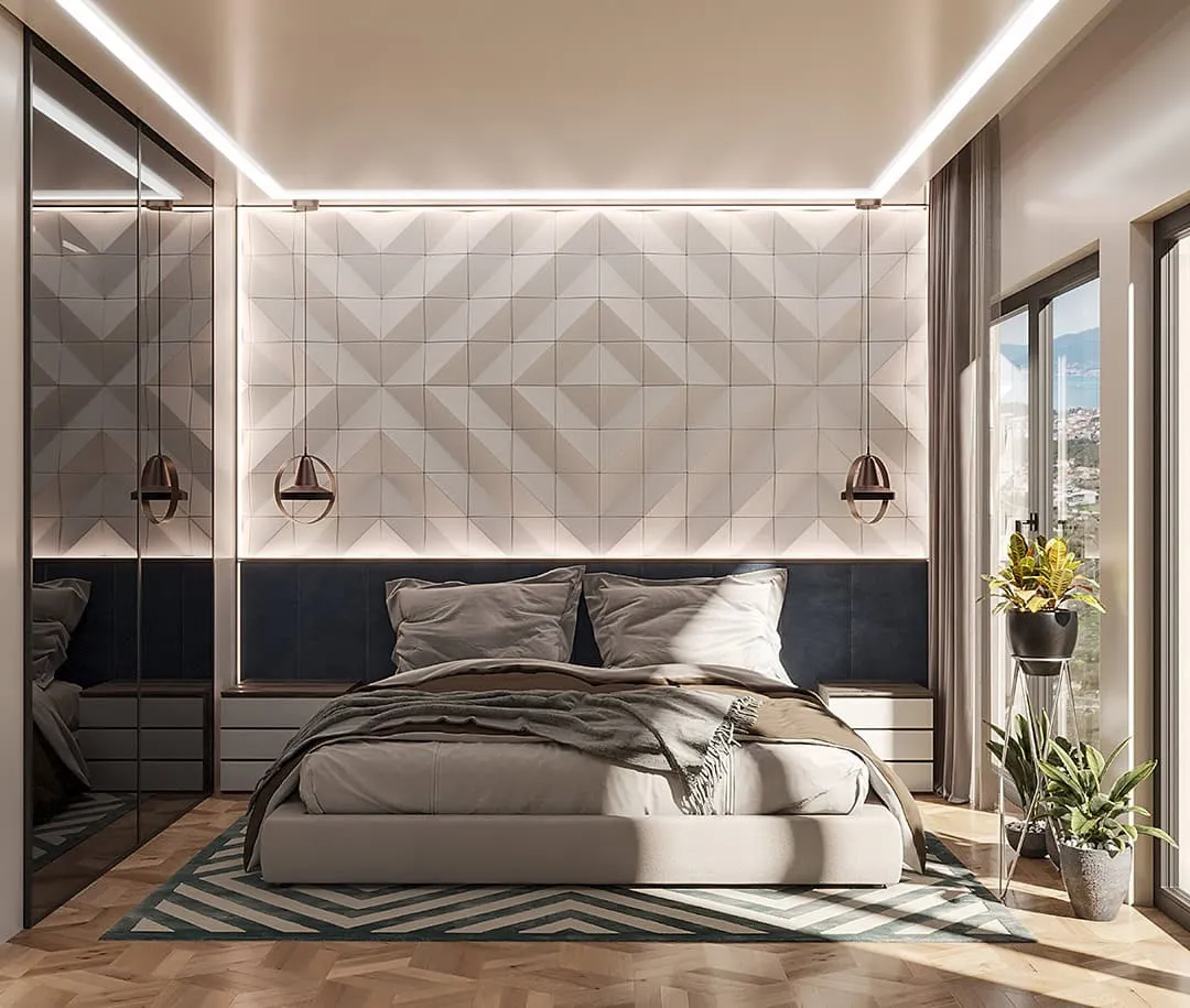 Modern bedroom featuring a large bed, geometric wall panel, pendant lights, and a mirrored wardrobe.