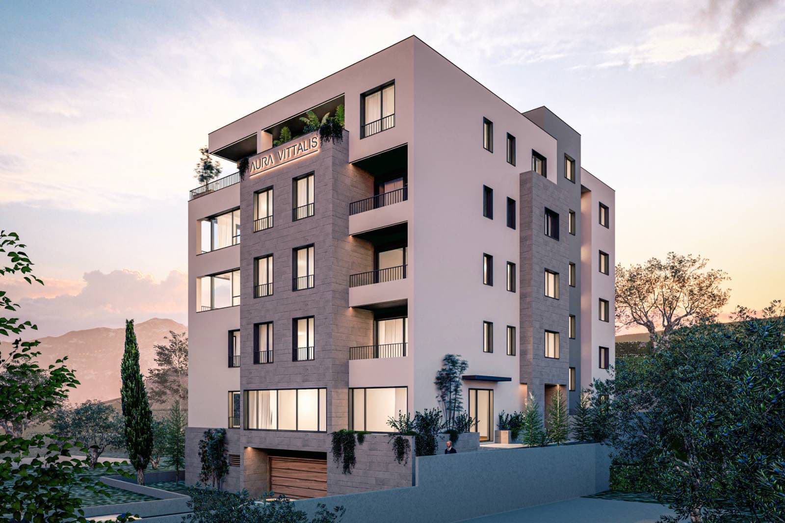 Modern multi-apartment residential building Aura Vittalis with balconies and panoramic windows in Budva, Montenegro