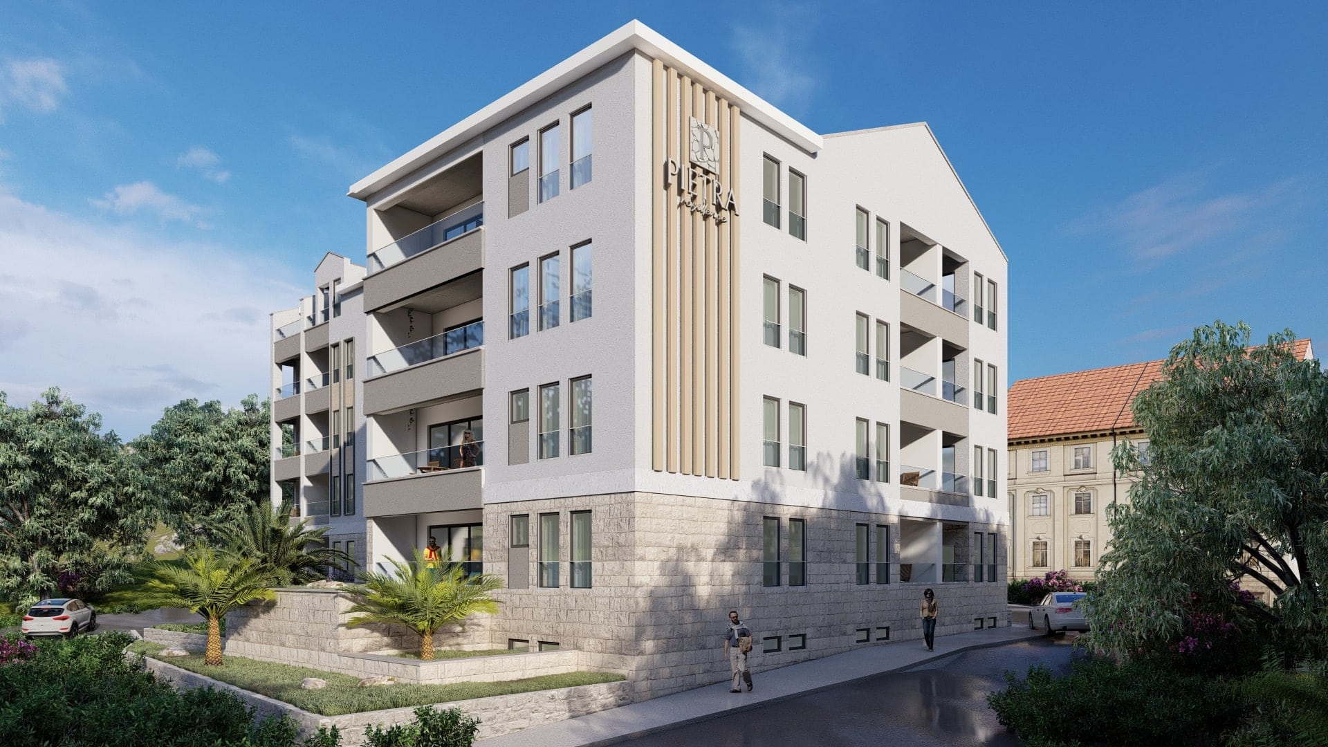 Modern residential complex Petra Residence in Budva, Montenegro: building facade with balconies and stone cladding.