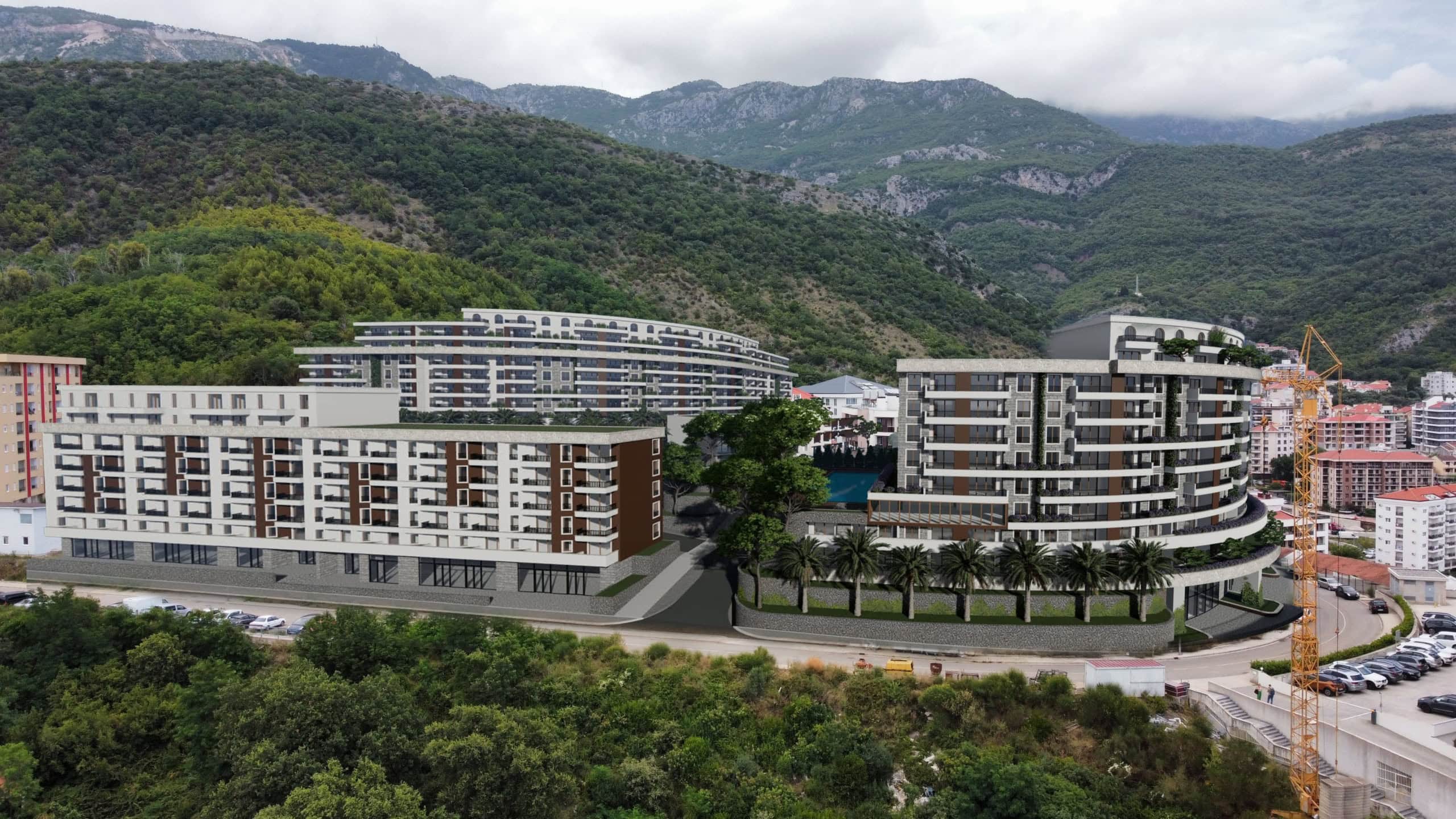 Visualization of a modern residential complex in Bečići, Montenegro: panoramic view of the buildings with terraces and the mountains.