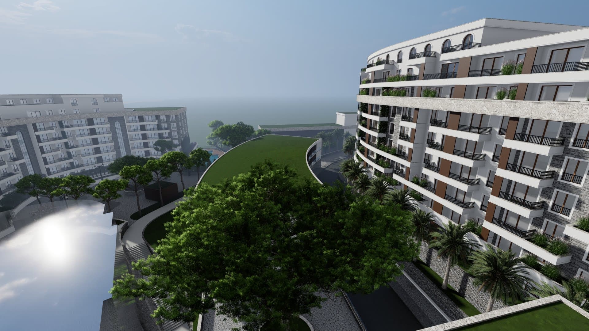 Modern residential complex with terraces and green areas in Bečići, Montenegro — view of the architecture and grounds.