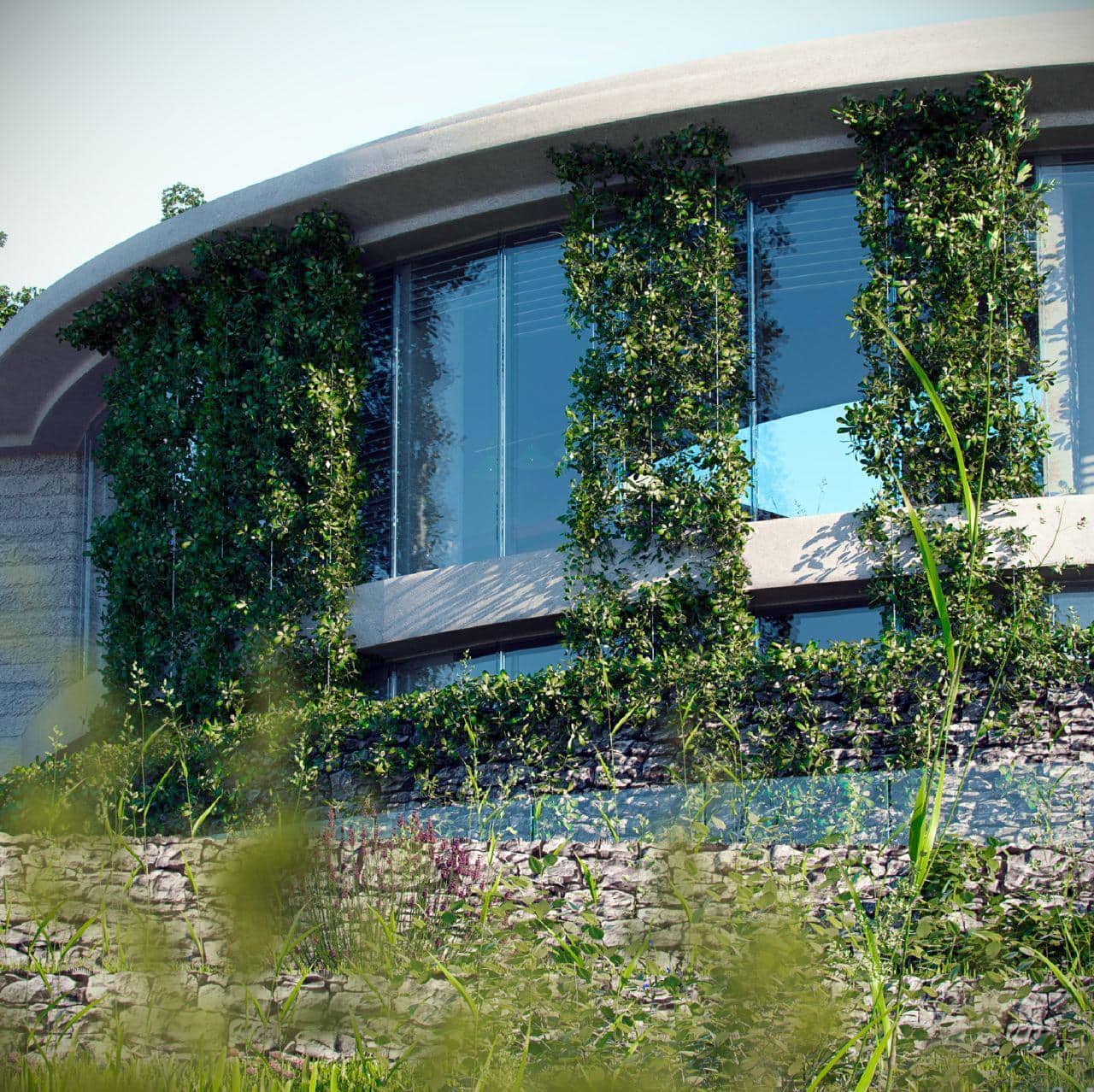 Modern villa with panoramic windows and vertical landscaping on a plot in Blizikuće, Montenegro.