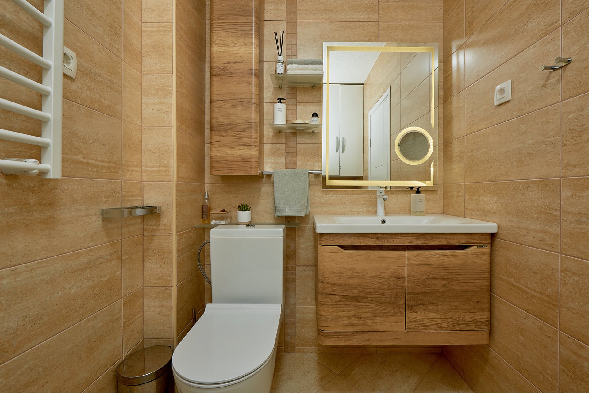 Modern bathroom with wood-like finish in an apartment, penthouse in Bečići, Montenegro.