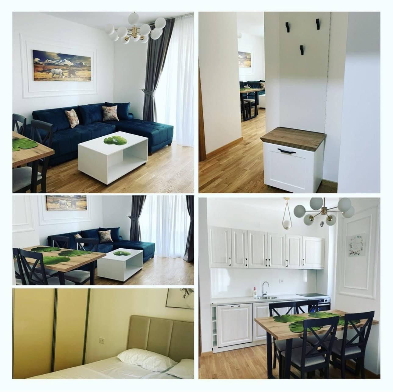 Interior of a modern apartment in Bečići, Montenegro: a living room with a blue sofa, dining area, and a bright kitchen.