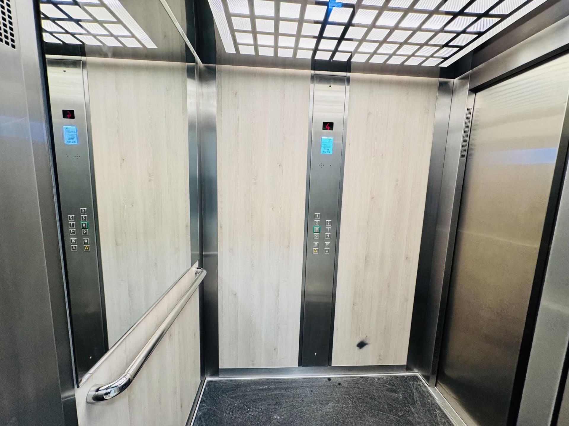 Modern elevator with light wood finish in a residential complex in Bečići, Montenegro.