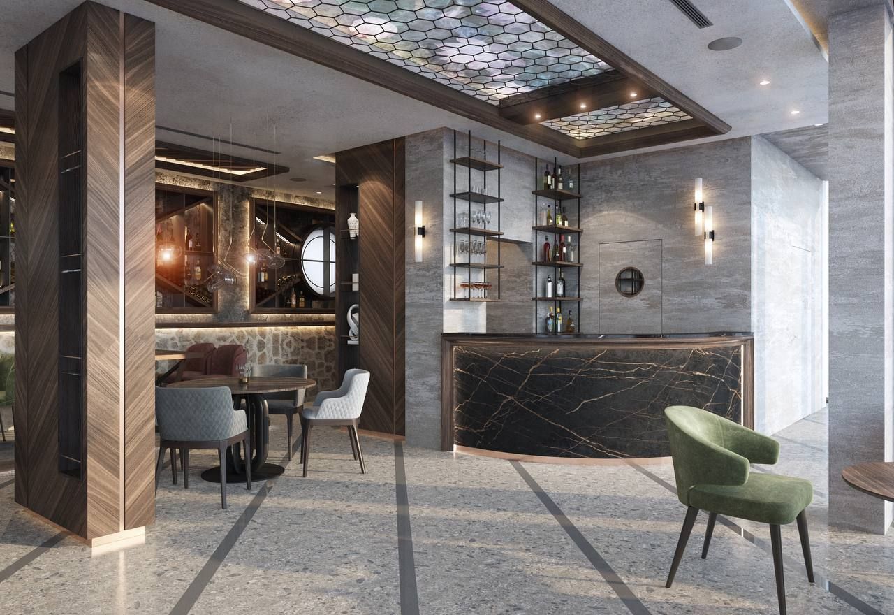 Interior of the villa lobby bar in Petrovac, Montenegro: black marble bar counter, designer furniture, and decor.