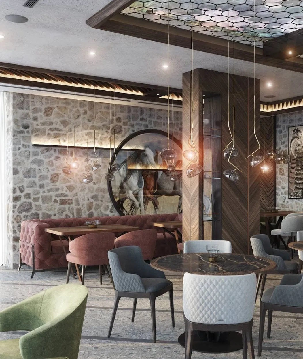 Restaurant or lobby interior featuring stone walls, upholstered seating, dining tables, and decorative pendant lights.