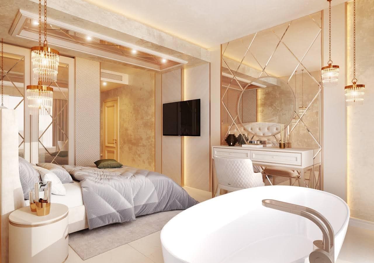 Luxurious bedroom with bathroom and mirrored decor in a villa in Petrovac, Montenegro: stylish interior and design.