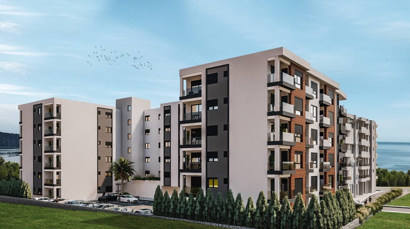 Modern residential complex with balconies and sea view in Bar, Montenegro: exterior of a new building.