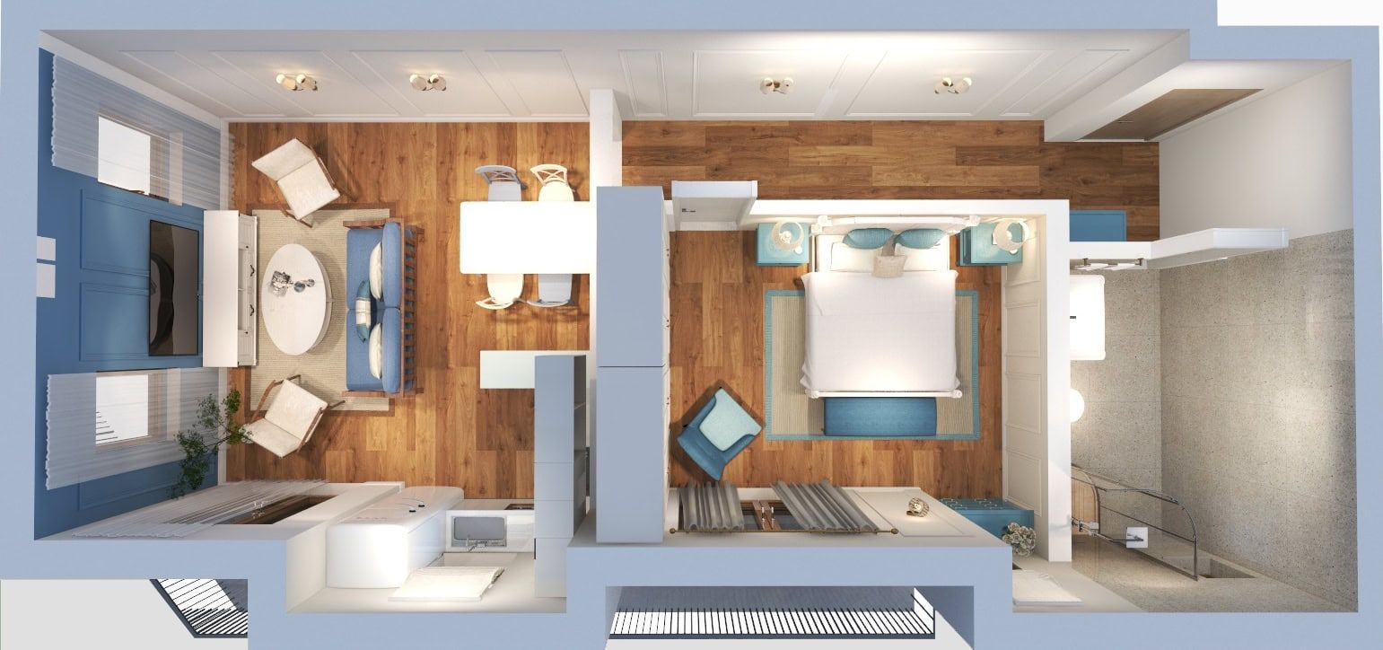Apartment layout in the Risan residential complex, Montenegro: top view of the living room, bedroom, kitchen, and bathroom with modern furniture.