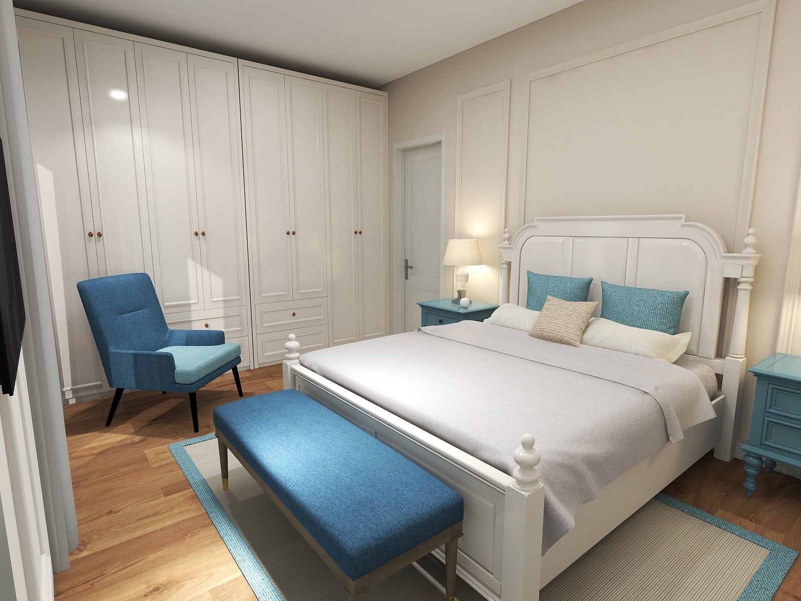 Bright classic-style bedroom in the Risan residential complex, Montenegro: white bed, built-in wardrobe, and blue furniture.