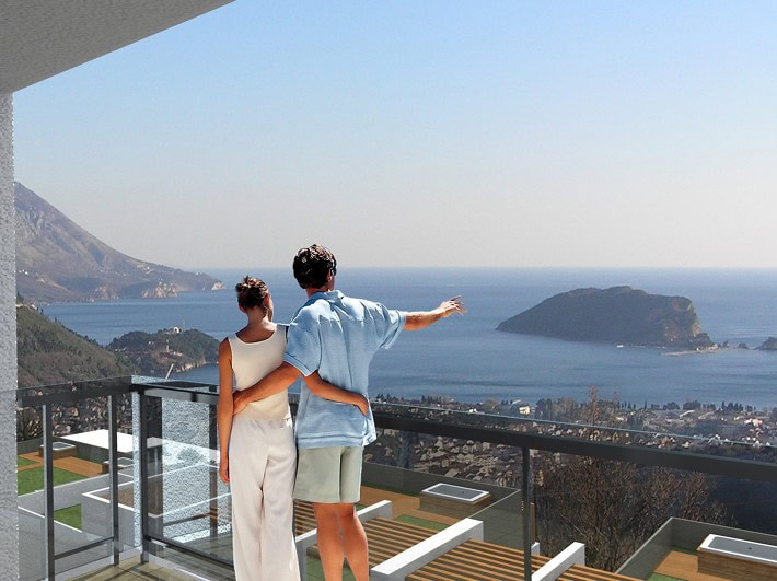Panoramic sea and island view from the apartment balcony in Budva, Montenegro: modern railing and terrace.