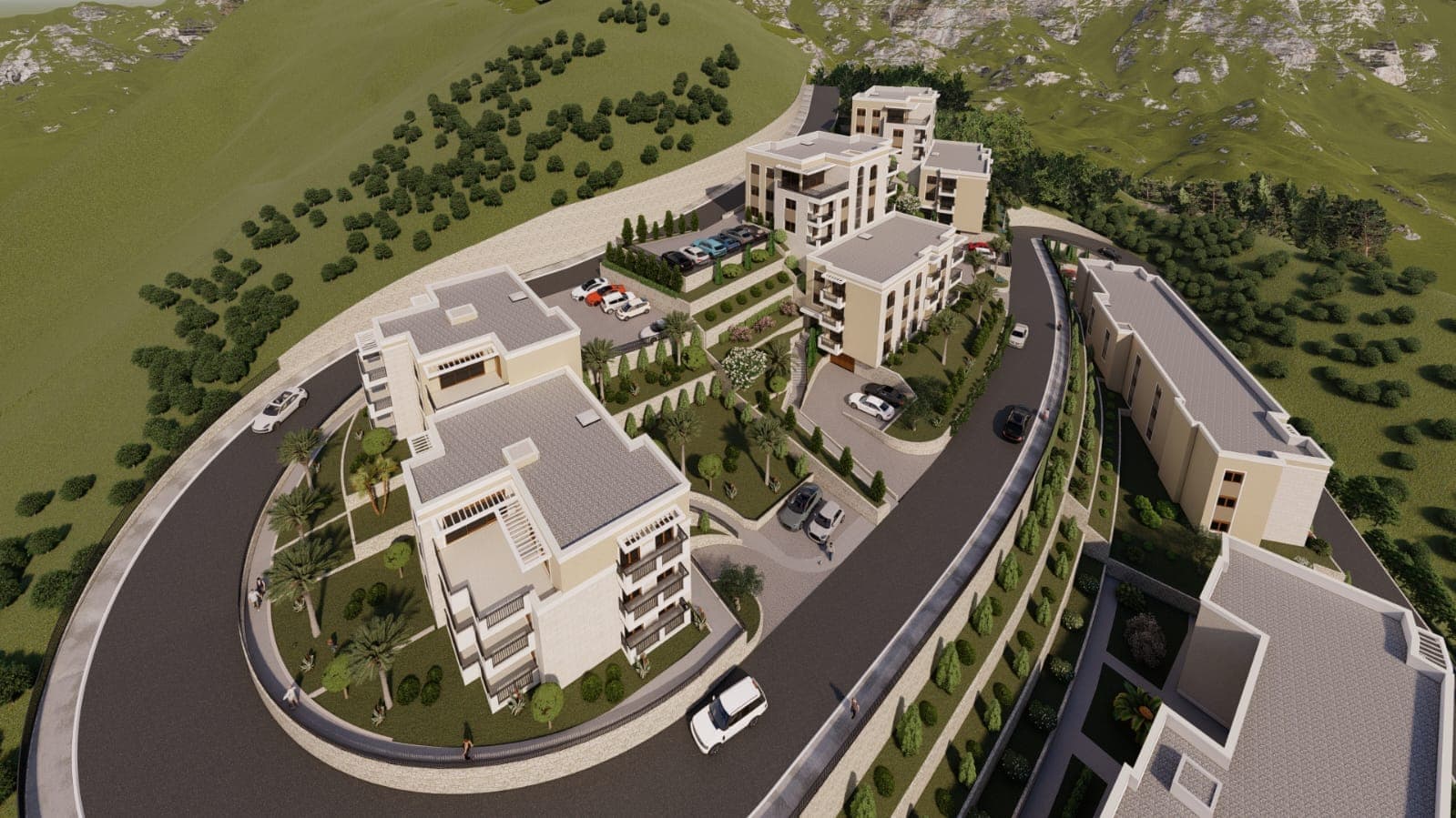Top view of a modern residential complex in Budva, Montenegro: apartment buildings, parking, and landscaping.